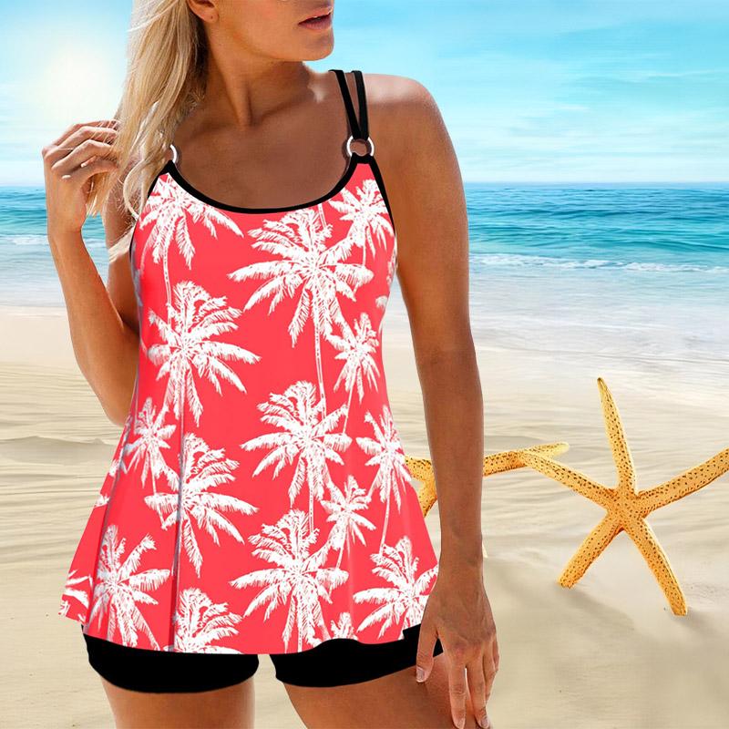 Женский купальник с бретелями и маленьким бикини с ромашками и короткой майкой.