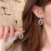 Серьги-капли из циркония с покрытием из 18-каратного золота: Элегантные серебряные аксессуары для женщин