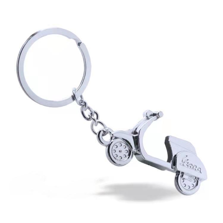 Металлический брелок для ключей в виде мотоцикла с лазерным логотипом - уникальный рекламный подарок или небольшой жетон.