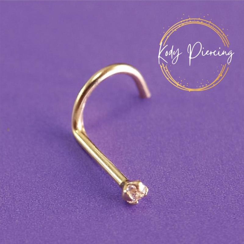 KODY PIERCING Изогнутый стержень из 14-каратного золота и циркона диаметром 1,5 мм.