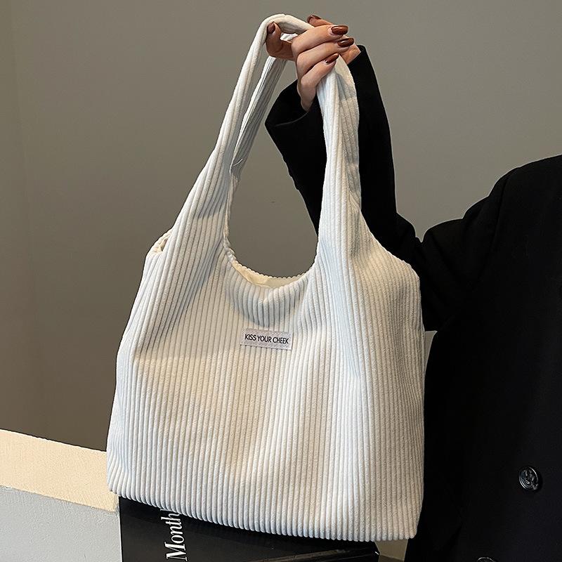 Niche Casual Bag for Women New Corduroy Striped Shoulder Bag for Students Commuting Pleated Early Eight Armpit Bag