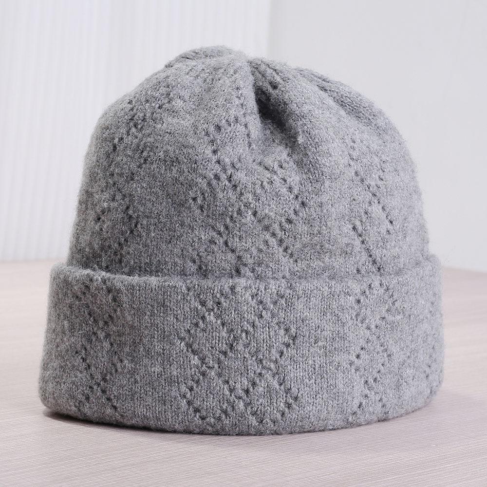 Thickened simple personalized women's pile hat autumn and winter knitted hat cold hat confinement hat outdoor riding ear protector wool hat