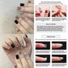 Short Fake Nail Decals With Black Sparkling Water Diamoans And Star Motifs For Cute And Trendy Nail Looks