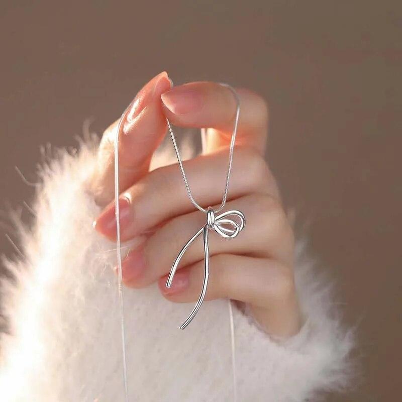 Модное серебряное ожерелье с лентой и бантом для женщин и девочек, новинка 2024 года, простая металлическая цепочка из змеиной кости, ожерелье, ювелирное изделие, подарок