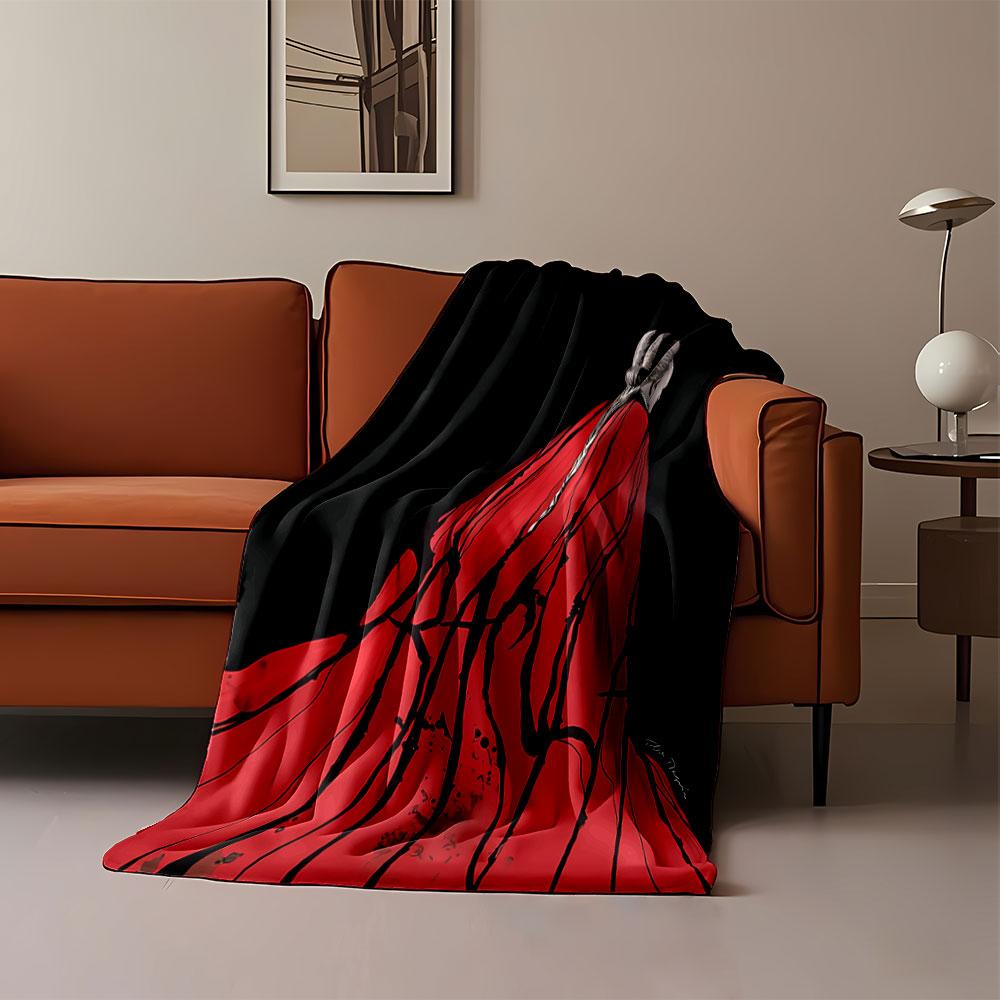 A red flowing cloak with black streaks resembling dripping blood. for all seasons blanket lunch break throw gift