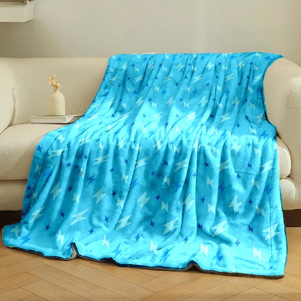 The pattern consists of scattered lightning bolt shapes in varying blue tones. for all seasons blanket lunch break throw gift