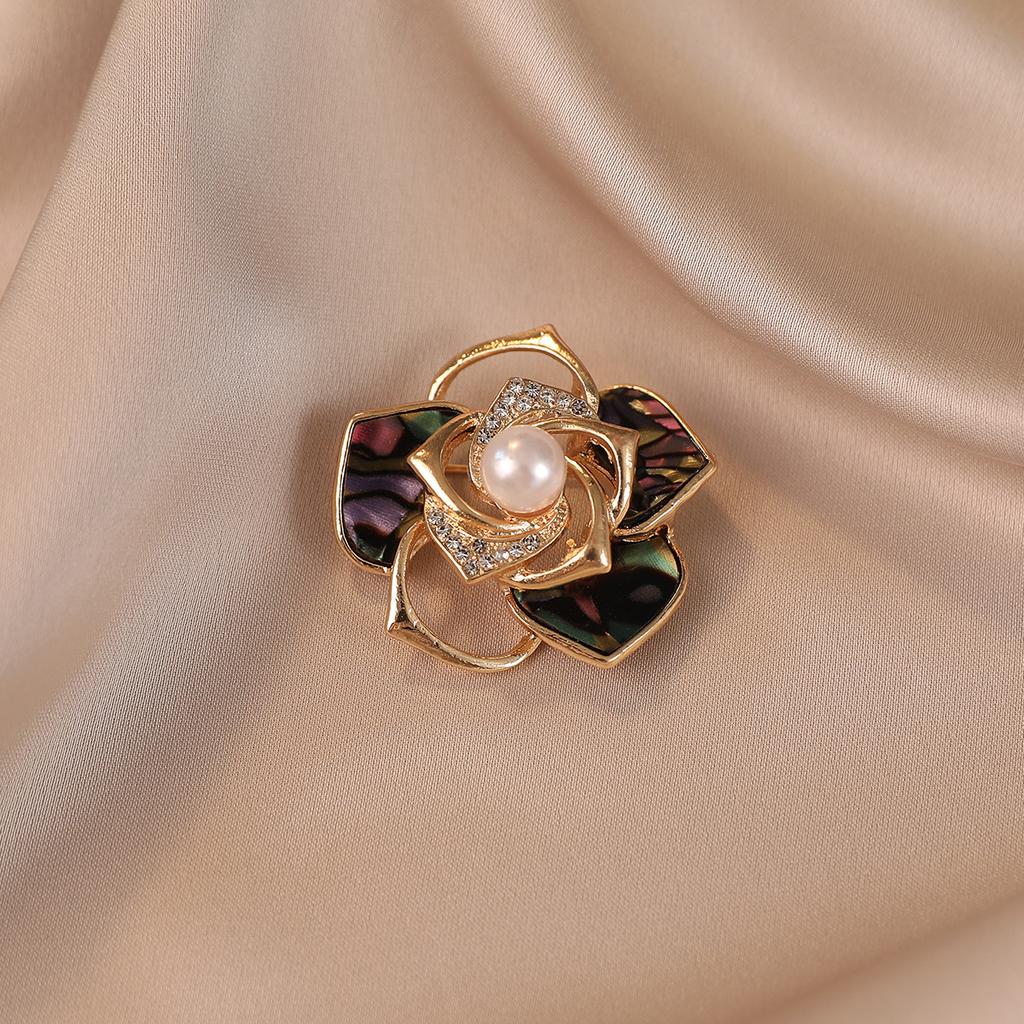 A Delicate Pearl Garland Brooch with A Little Design Elegant and Fashionable for Women and A Sweet New Camellia Corch