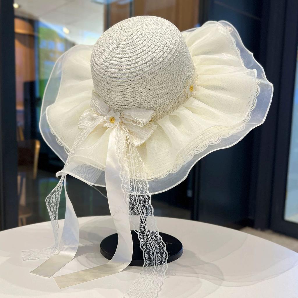 Bow flower big brim beach straw hat women spring and summer new seaside sunshade sun hat tide