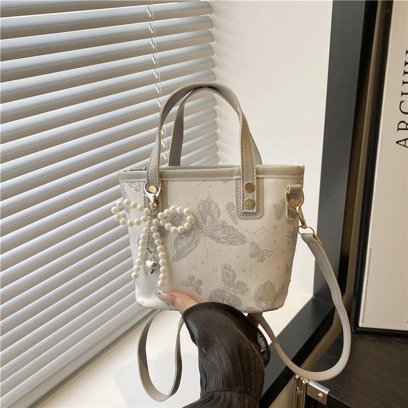 Элегантная женская повседневная сумка через плечо с узором «Бабочка» и цветовым блоком, с подвеской, для ежедневного использования