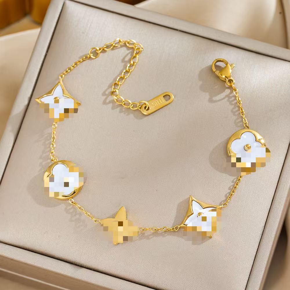 Браслет из титана с покрытием из 18-каратного золота 'Четырехлистный клевер' - Универсальный, не выцветающий, модный аксессуар класса люкс с перламутровыми акцентами