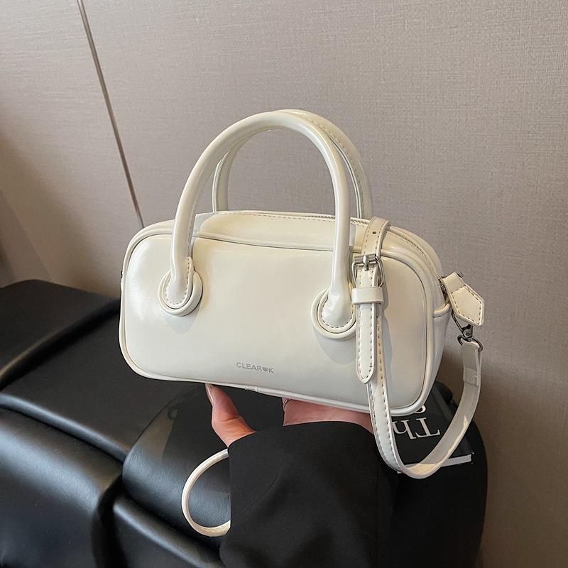 Premium texture simple casual commuter handbag women's 2025 spring new trend versatile messenger pillow bag