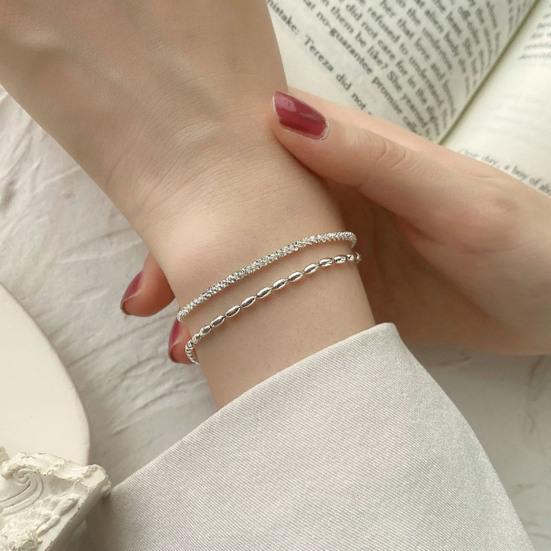 Женский браслет двухслойный регулируемой длины с удлиненной цепочкой из полой меди