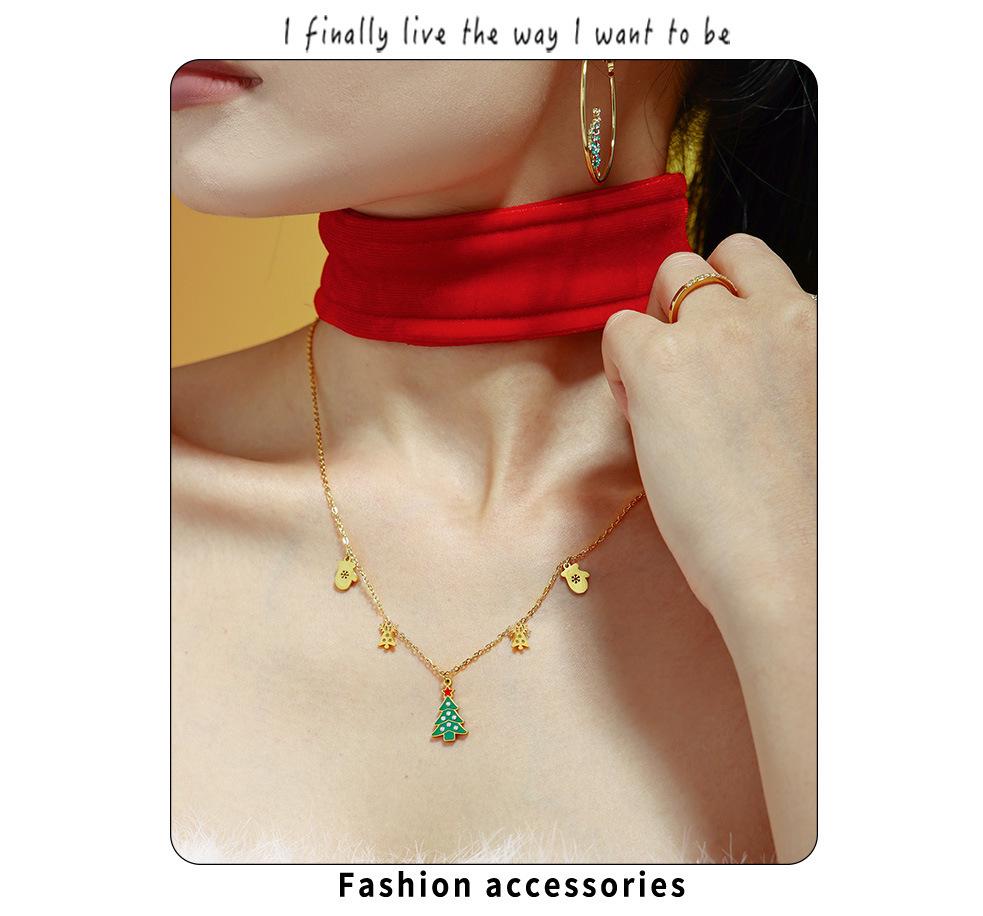 Подвеска-кулон в виде зеленого эмалированного колеса обозрения на рождественскую елку с цирконом, кисточкой в виде оленя и цепочкой из нержавеющей стали.