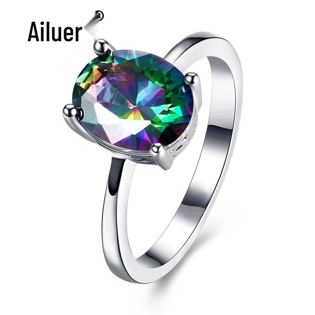 Женское кольцо-бестселлер из белого золота с овальным цирконом и кристаллами