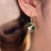 Зеленые серьги с пряжкой в ​​виде четырехлистного клевера Green Lucky, нишевые дизайнерские серьги, изысканные модные серьги-джокеры