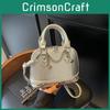 Modern Urban Shell Crossbody Bag With Chain Strap And Sewn Details For Casual Events And Outings