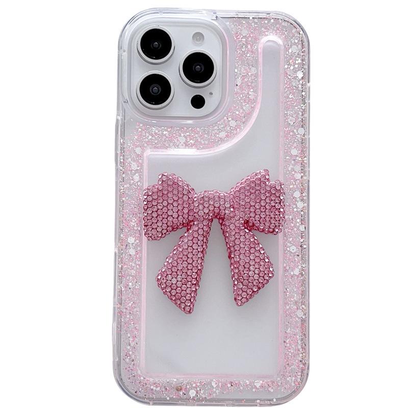 Прозрачный чехол для iPhone 16/15/14/13/12 с блестящими стразами и большим бантом.