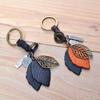 Retro Two-Color Cowhide Leaf Keychain for Men and Women