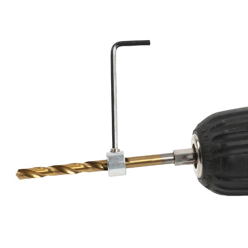 Регулируемое кольцо-ограничитель и ключ для позиционирования сверла по дереву