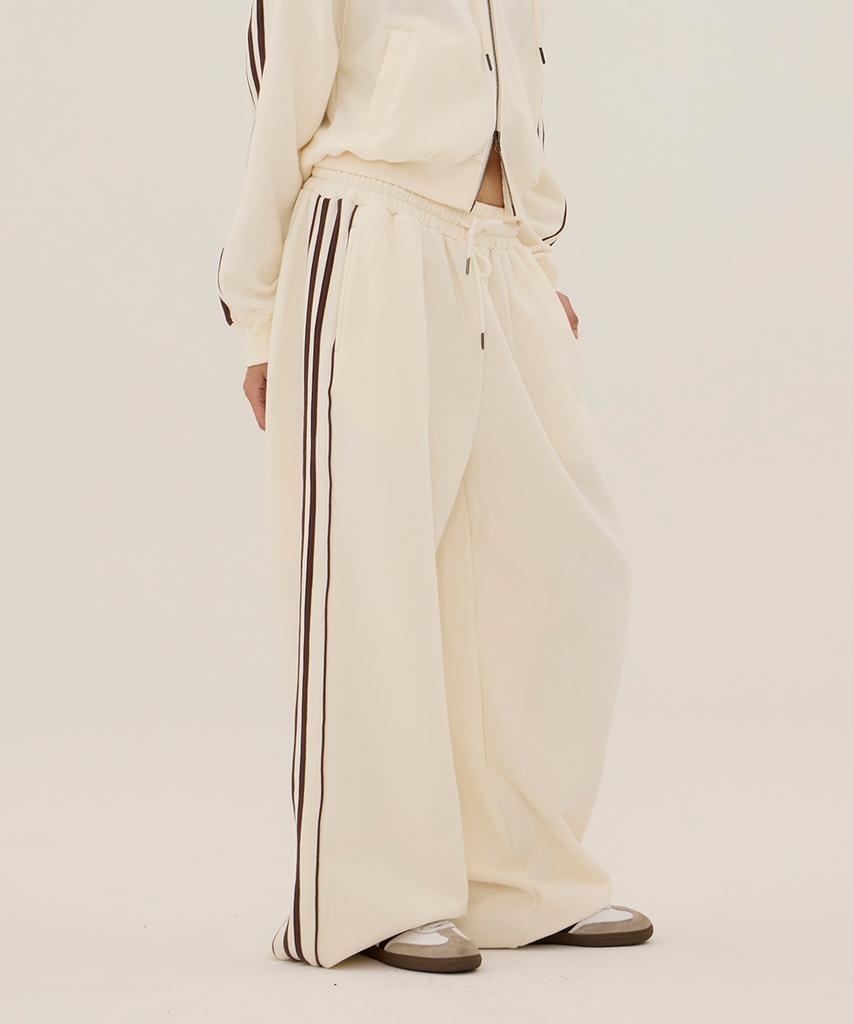 DANGLEDROP Dgdp Lettering Low-Rise Wide Track Pants_Ivory