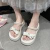 One-word cool slippers bow slippers women's summer wear 2025 new popular thick bottom two wear height-increasing skirt women