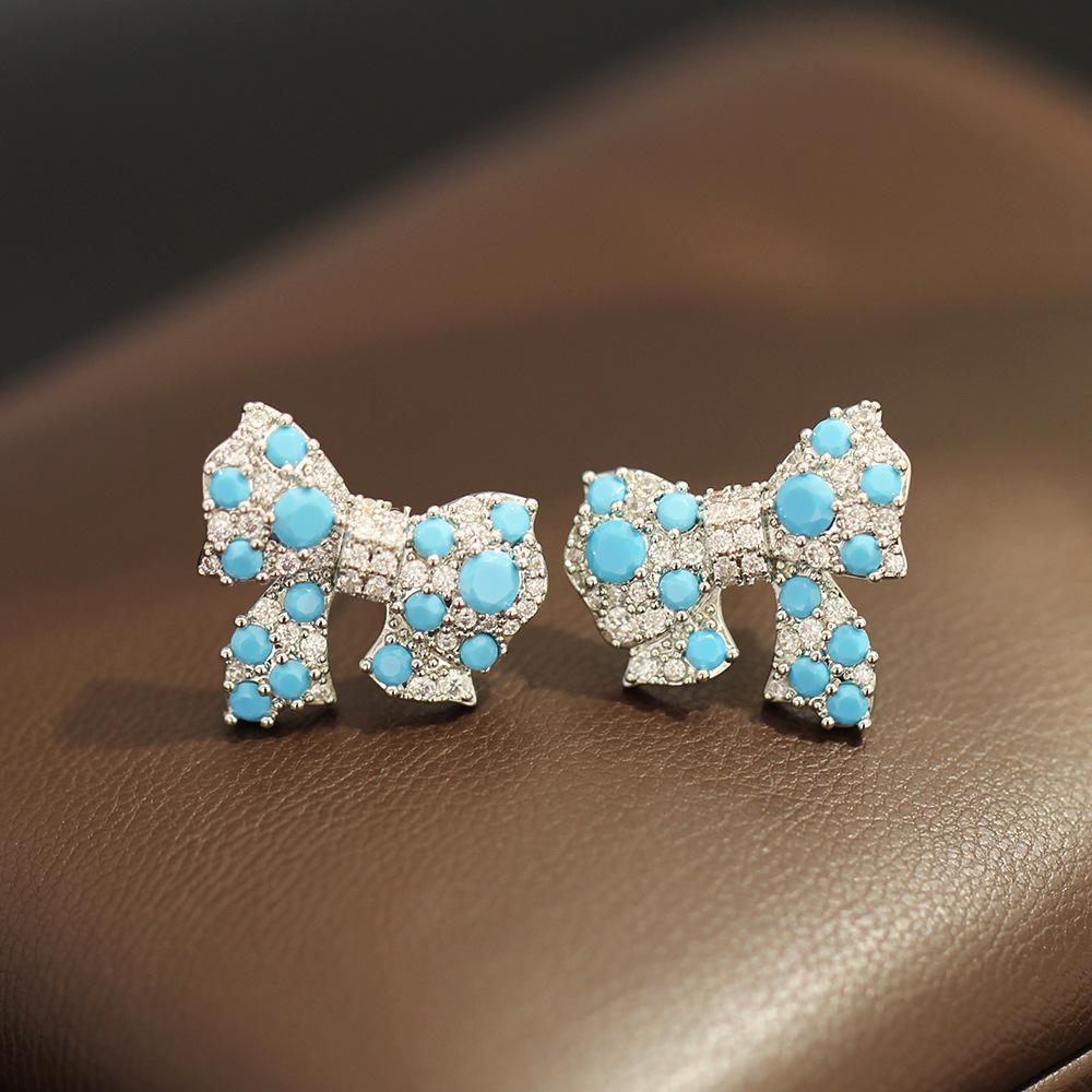 Shining diamond zircon bow stud earrings women's light luxury fashion personality niche design sense high-end sense earrings flash