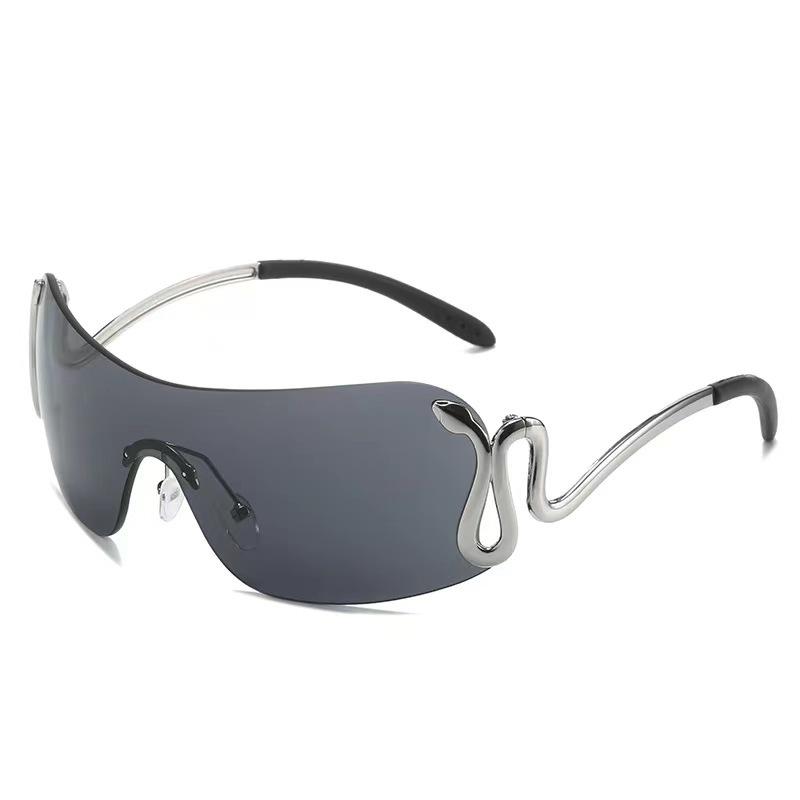 New style of seamless, one-piece metal frameless sunglasses, featuring a European and American design with a unique snake motif, fashionable tinted