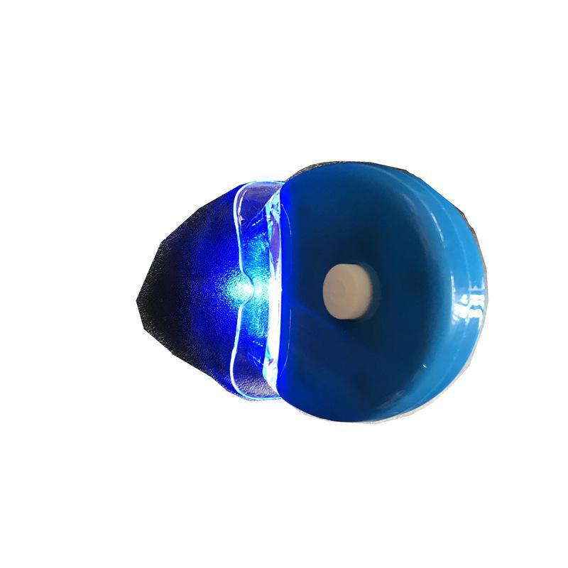 Qiao Qiang Mini Whitening Tooth Lamp: Portable Cold Light Device with Gel for Teeth Whitening, In White or Blue.