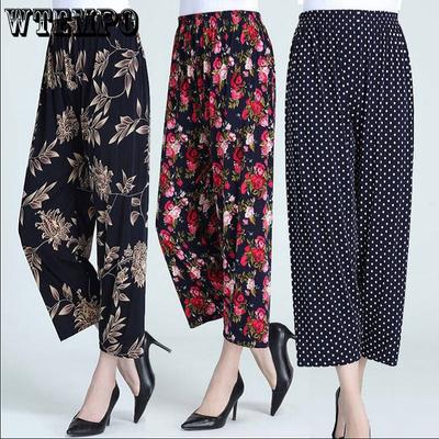 Летние брюки для женщин среднего и пожилого возраста. Прохладные брюки из ледяного шелка. Свободные брюки больших размеров с цветочным принтом. Укороченные брюки с эластичным поясом. Повседневные брюки.