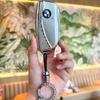 Чехол для ключа BMW: Совместим с X1, X2, X3, X4, X5, Новая 1 серия, 3 серия, 5 серия. Стиль клинка Ракушка с женской сумкой с пряжкой.