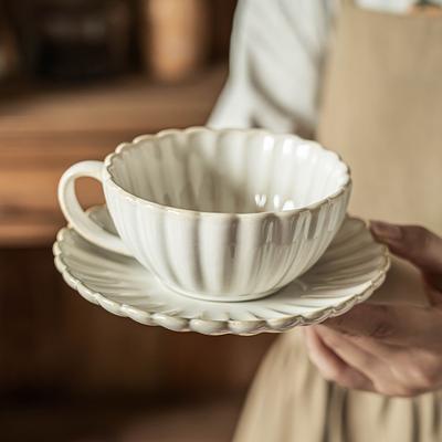 Изысканный набор чашки и блюдца, чашка для кофе в форме лепестка, керамическая чашка, кружка, чашка для послеобеденного чая, блюдце, бытовая чашка.