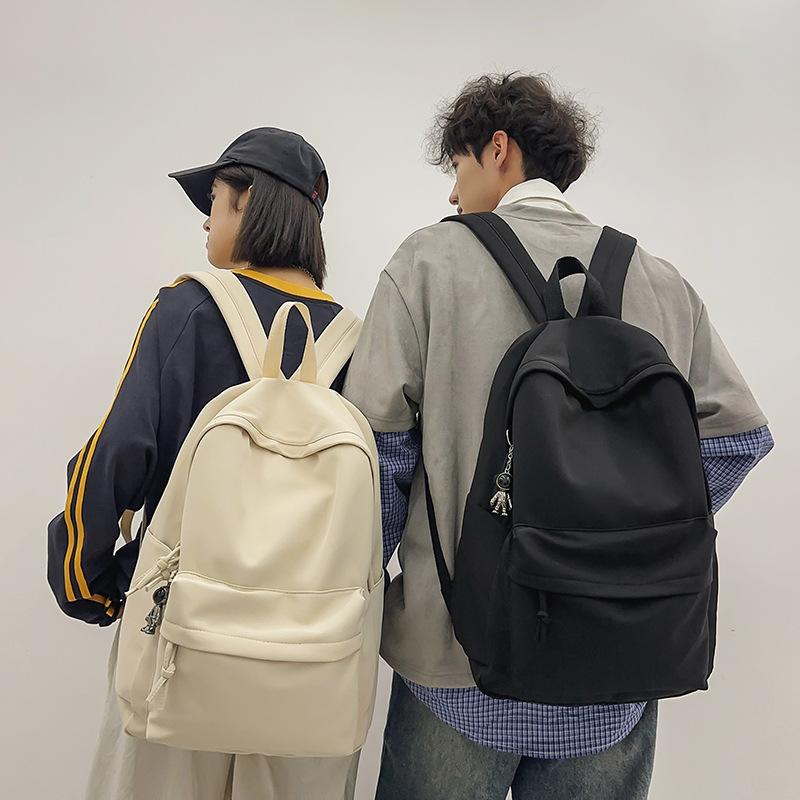 Large Capacity Backpack Male And Female College Students Simple Backpack Solid Color Texture High Value Student Schoolbag