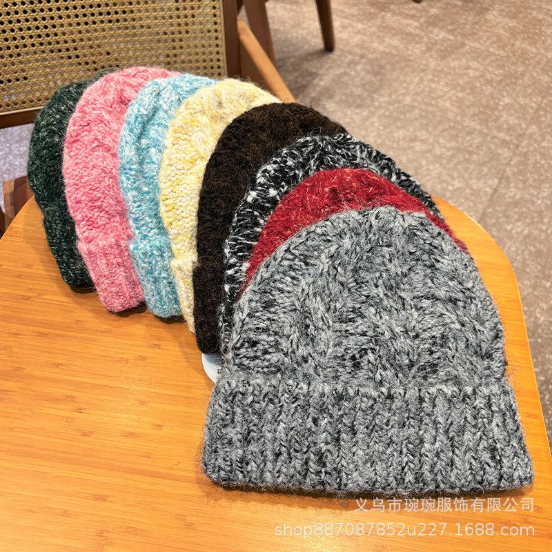 Autumn and winter warm atmosphere twist knitted wool hat men's and women's street fashion versatile mixed color pullover ear hat