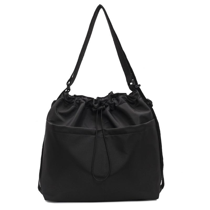 2024 New Japanese Solid Color One Shoulder Underarm Bag Folded Simple Drawstring Lightweight Casual Commuter Double Shoulder Bucket Bag