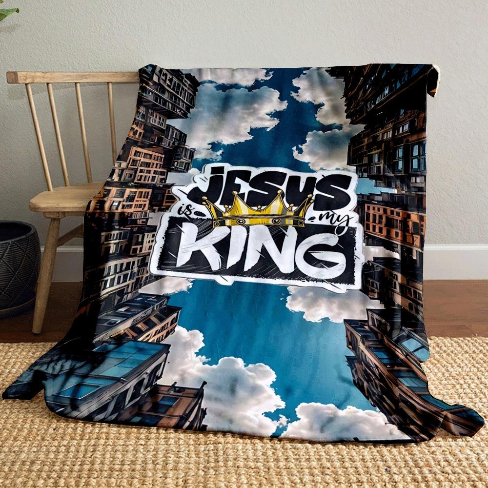 Text "Jesus is my King" overlaid on buildings converging toward the sky. for all seasons blanket lunch break throw gift