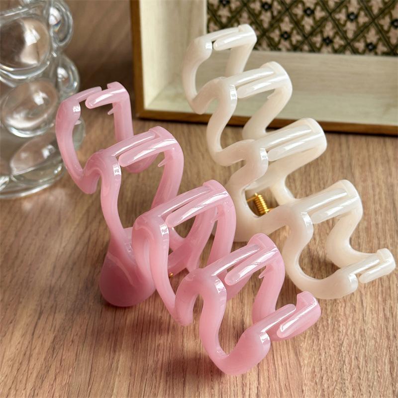 Fluid Wave Silhouette Hair Clip In Dreamy Translucent Hues Provides Secure Hold For Messy Buns And Modern Minimalist Updos