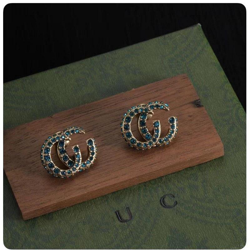 Серьги-гвоздики Gu Jia Double G с синими стразами - Винтажный дизайн из латуни с серебряной иглой