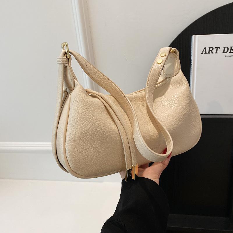 Bag women's new simple texture shoulder messenger bag lychee pattern niche fashion portable dumpling bag