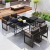7-Piece dining table and chair set for 6 people, table made of tempered glass, armrests of plastic and wood, suitable for backyard, garden patio