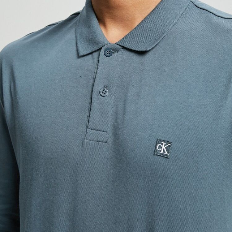 Calvin Klein Однотонная повседневная рубашка поло с длинным рукавом для мужчин, синяя J322583-DA0