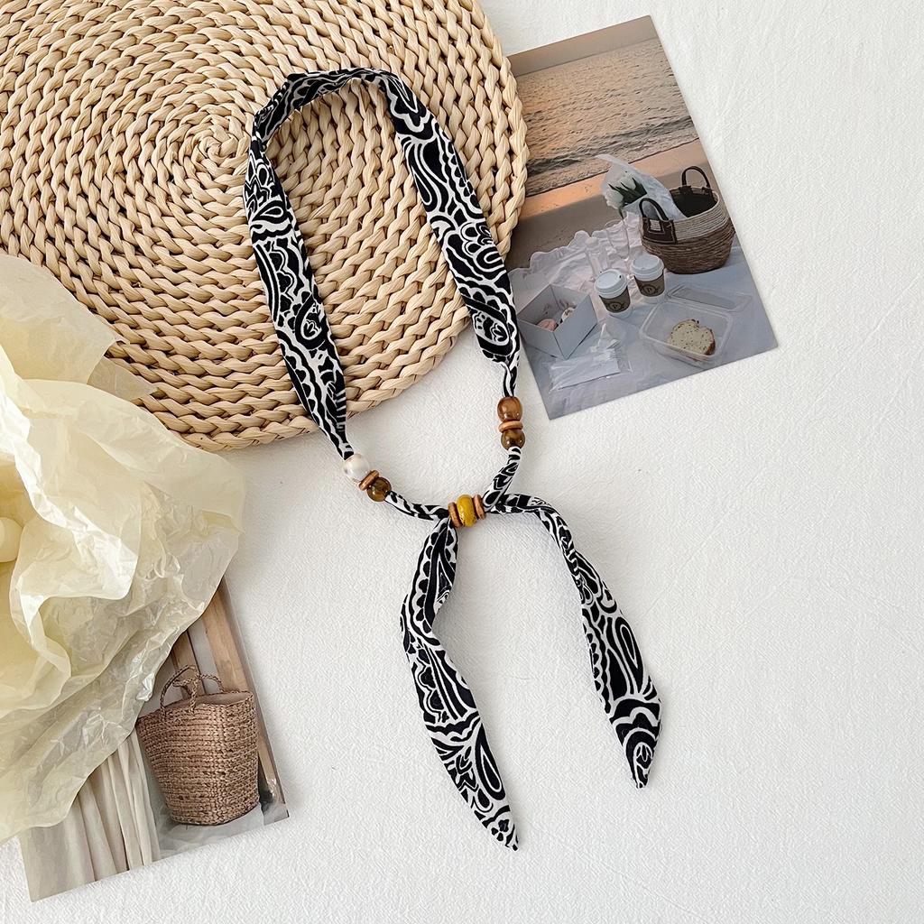 Korean version versatile classic leopard print beaded silk scarf women's summer decoration long strip small scarf adjustable thin scarf
