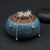 White Gold Exquisite Flower And Leaf Tassel Earrings With Cz Stone Embellishment