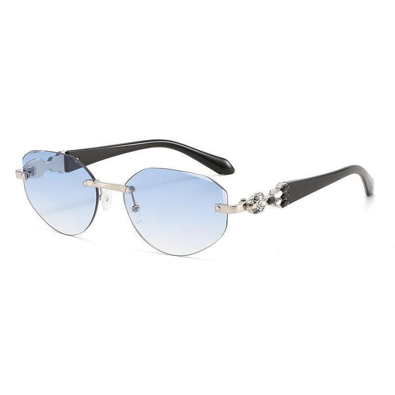 European and American frameless oval cat eye sunglasses women's square and round face thin fashion glasses gem-set diamond light luxury sunglasses