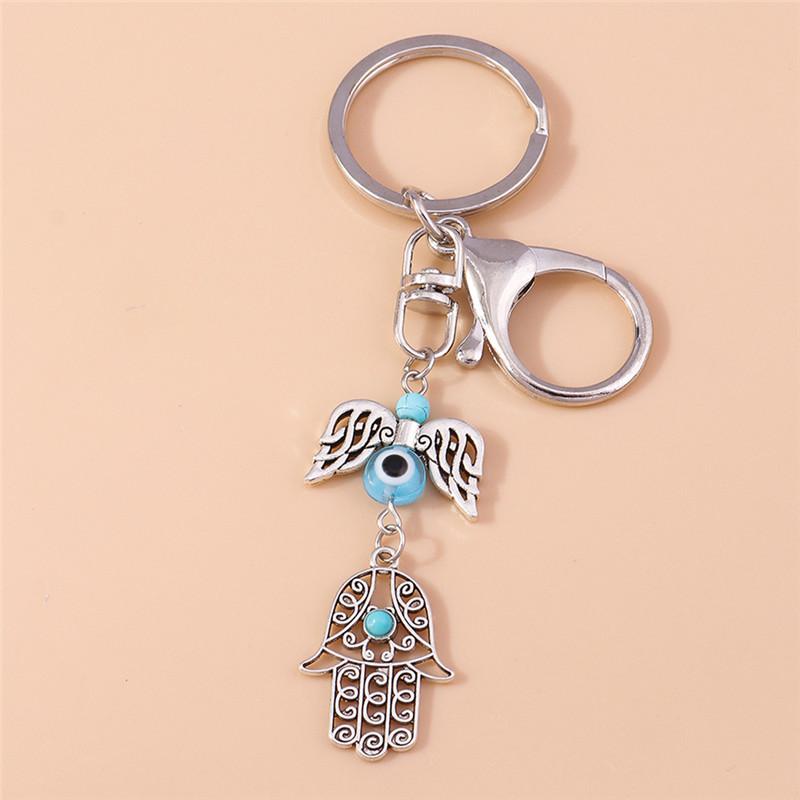 1 шт. Богемный брелок с хамсой и злым глазом для женщин и мужчин, брелок с синим глазом, солнцем и пером, подвеска для сумки, кольца для ключей от машины, оптом