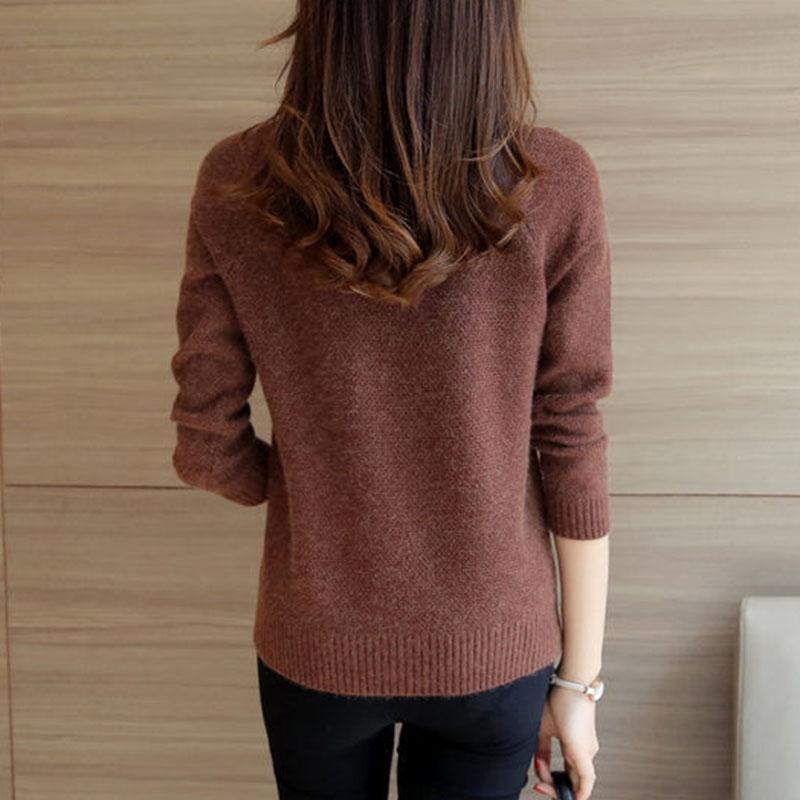 Стильный женский пуловер с разрезами по бокам