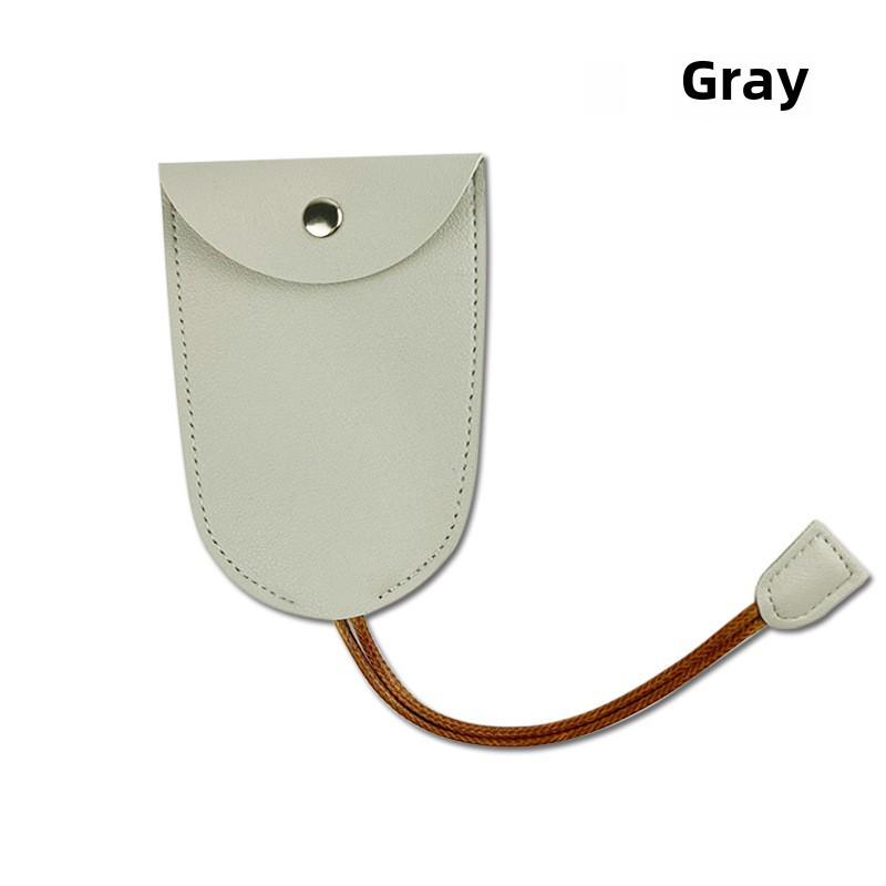 "Compact PU Leather Key Storage Pouch with Pull-Out Feature"