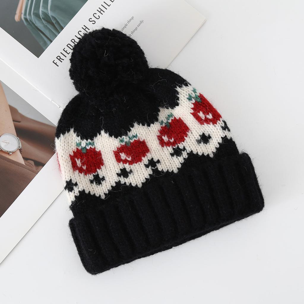 Fair Island wind red strawberry hairball wool hat women's autumn and winter cute cold and warm mountaineering ear protection knitted hat