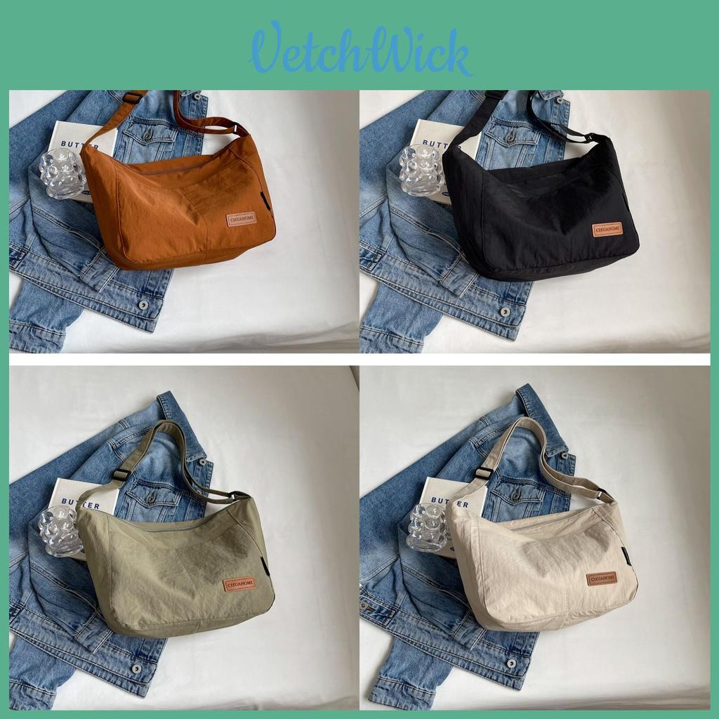 Minimalist Canvas Shoulder Bag With Sewn Detailing And Spacious Interior For Commuting