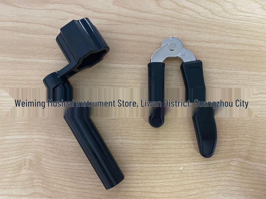 Bakelite Multi-Functional Guitar Tool: String Winder, Pin Puller, Pin Remover, and String Cutter.