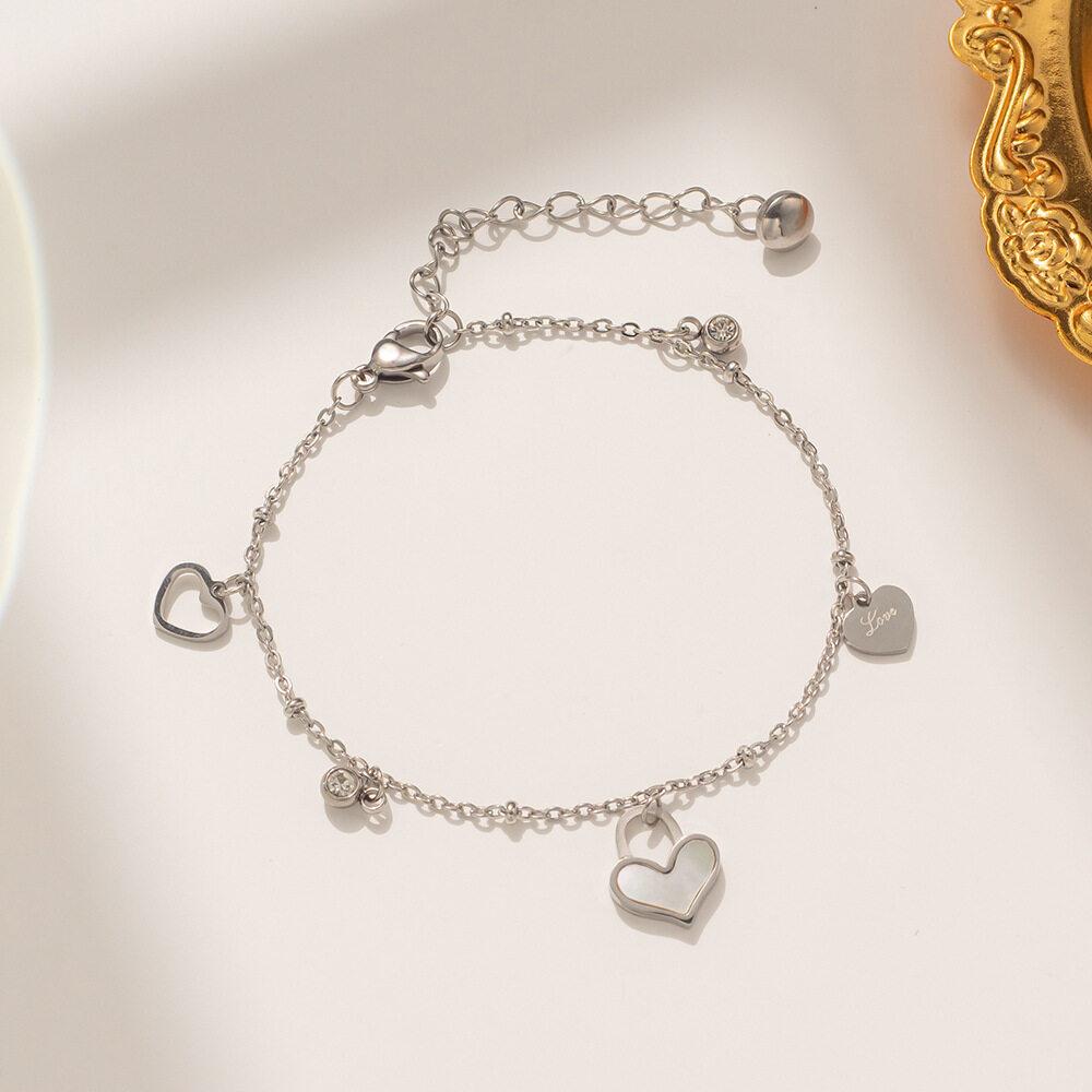 Темпераментный двусторонний браслет из нержавеющей стали, черный/цвет ракушки, четырехлистный клевер, элегантный браслет из розового золота